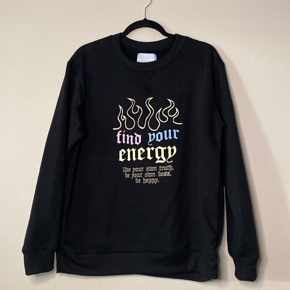 A black graphic boyfriend crew sweatshirt from refuge athletics.